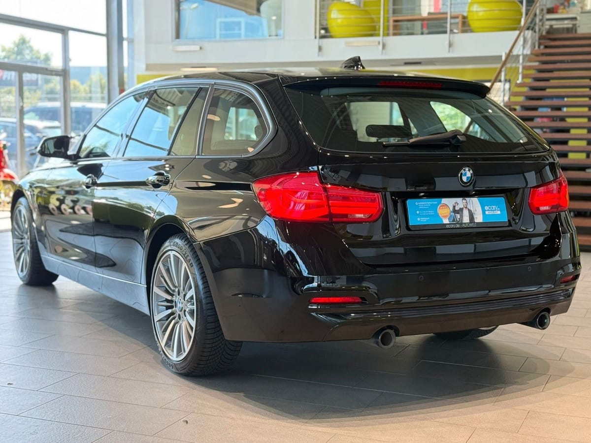 BMW 340i Touring xDrive Sport Line AHK Kamera ACC foto 4