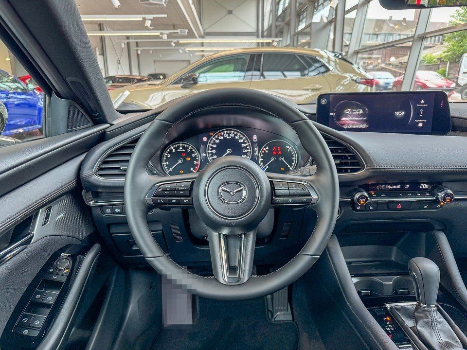 Mazda 3 Exclusive-Line foto 8