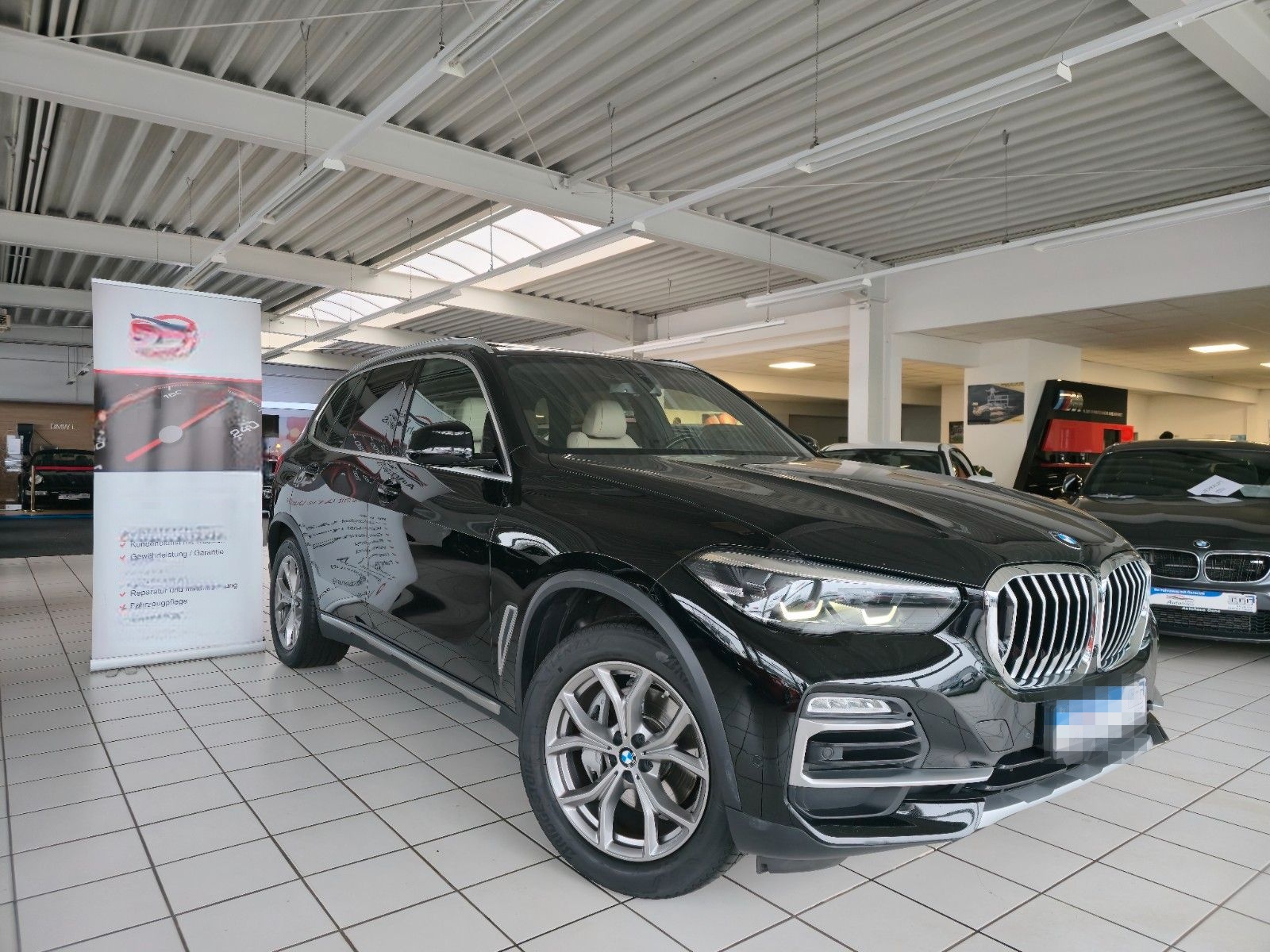 BMW X5 xDrive30d xLine 7-Sitzer AHK Live Cockpit foto 4