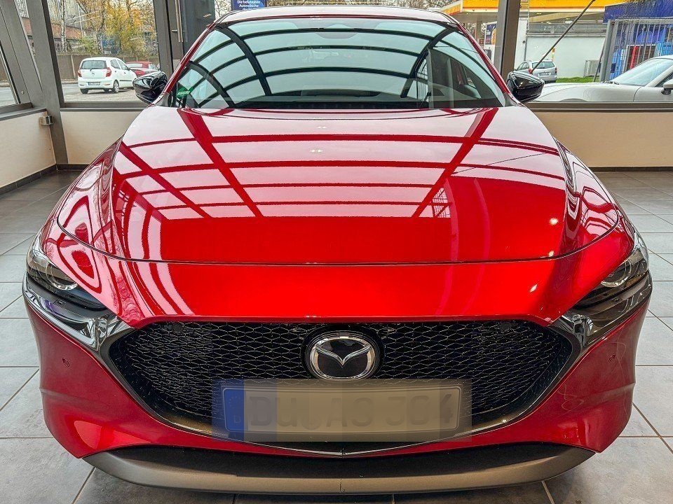 Mazda 3 Homura foto 2