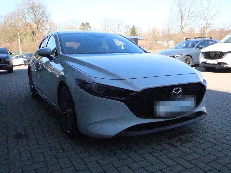 Mazda 3 M-Hybrid G-140 Exclusive-Line Allwetter NAVI 3 foto 6