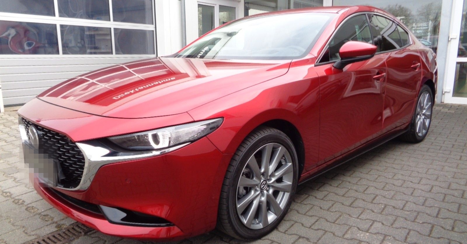 Mazda 3 Fastback Exclusive-Line foto 2