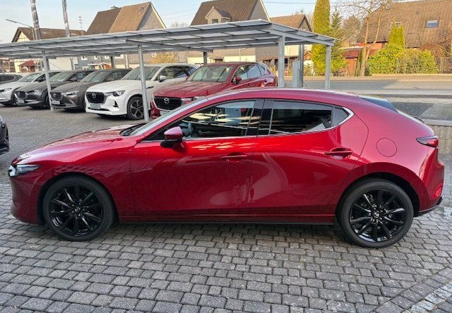 Mazda 3 SKYACTIV-X 2.0 Edition100 mit Winterrädern + A foto 2