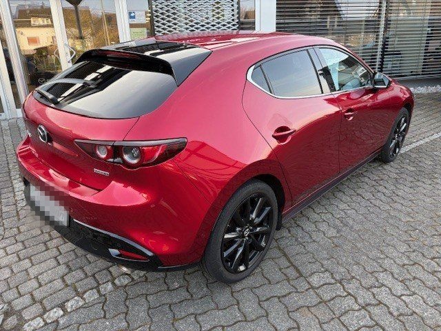 Mazda 3 SKYACTIV-X 2.0 Edition100 mit Winterrädern + A foto 5