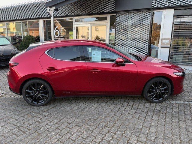 Mazda 3 SKYACTIV-X 2.0 Edition100 mit Winterrädern + A foto 6
