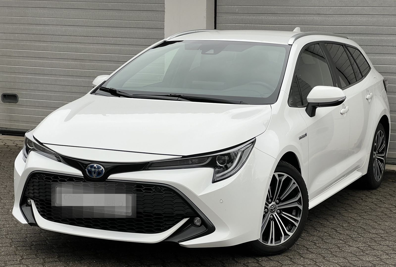 Toyota Corolla Touring Sports 1.8 Hybrid Team D 1.Hand foto 1