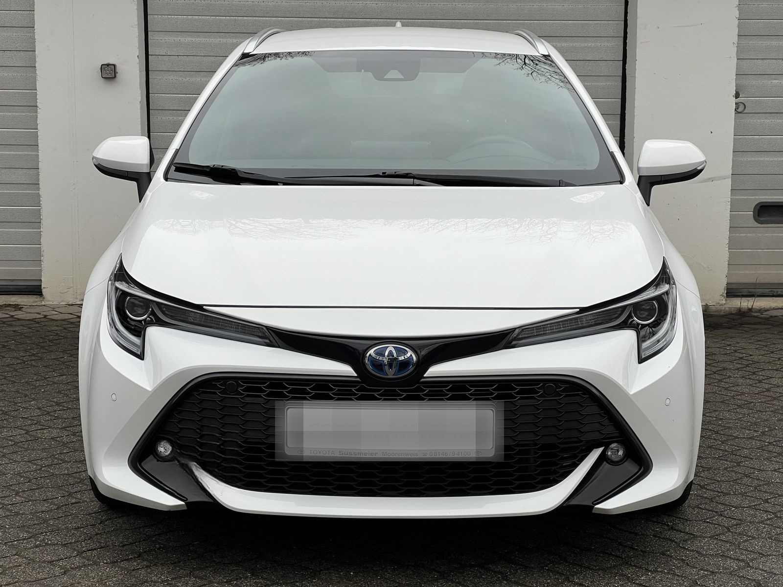 Toyota Corolla Touring Sports 1.8 Hybrid Team D 1.Hand foto 3