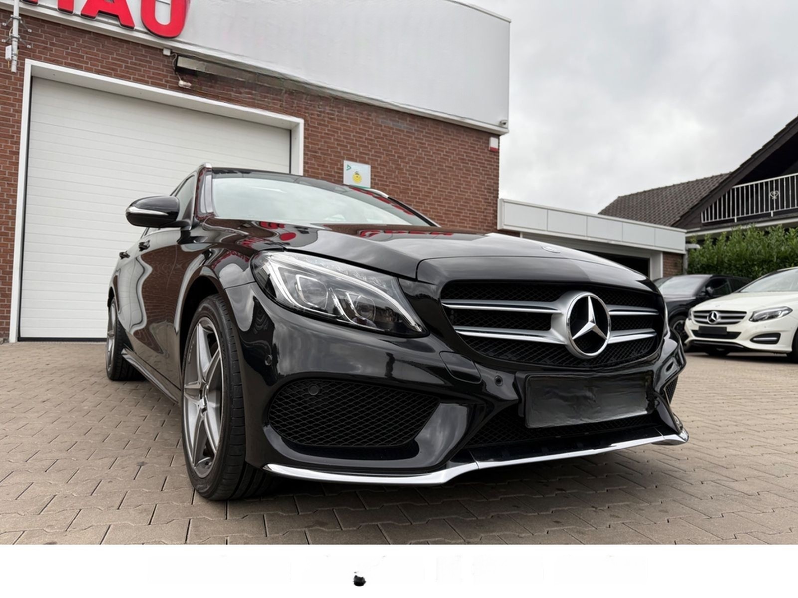 Mercedes-Benz C-Klasse C 400 T-Modell 4Matic AMG Line foto 2