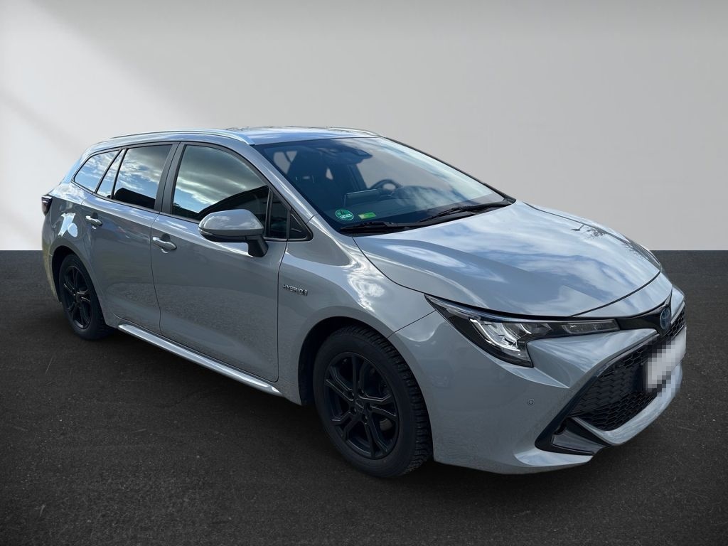 Toyota Corolla 1.8 Hybrid Touring Sports Business Editi foto 2