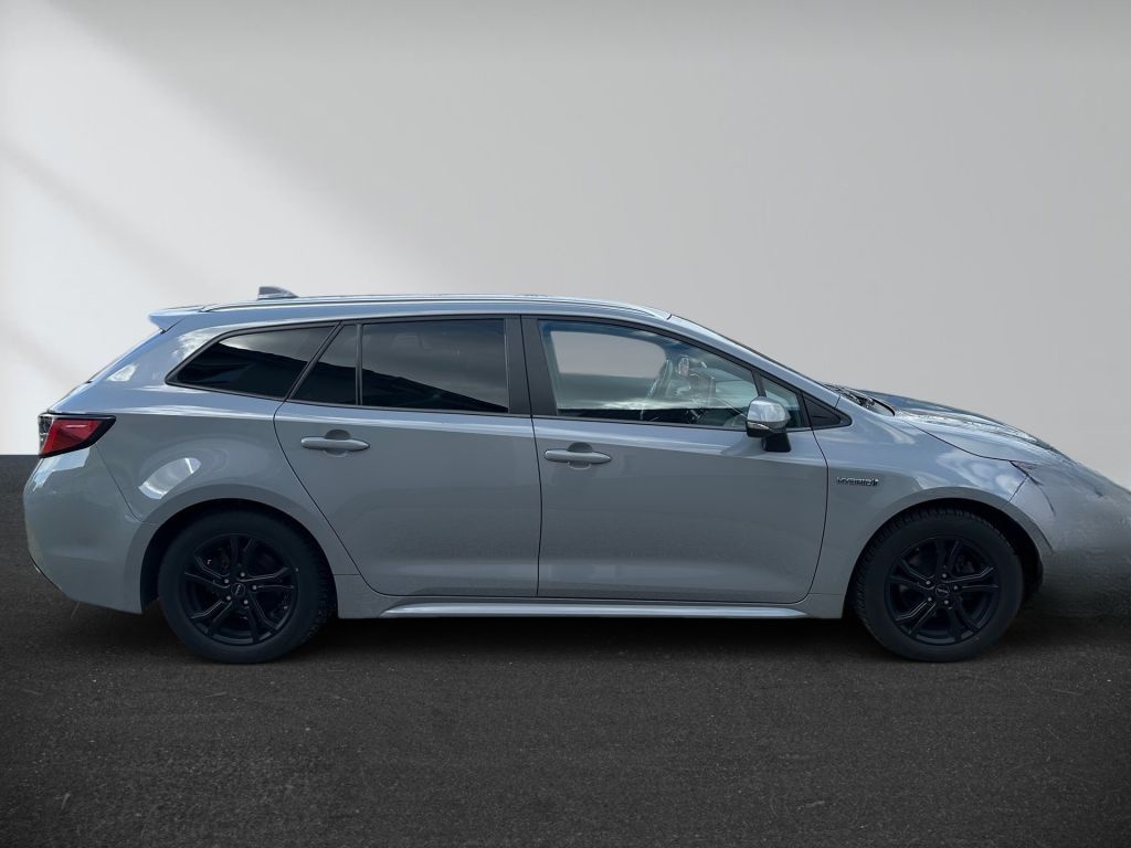 Toyota Corolla 1.8 Hybrid Touring Sports Business Editi foto 3