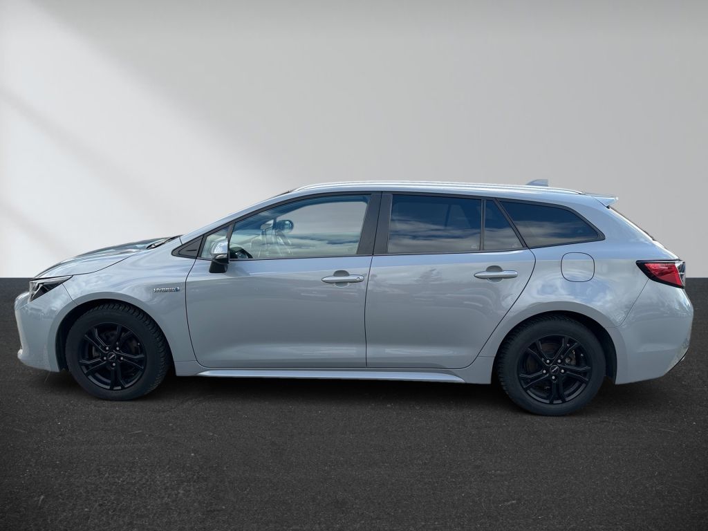 Toyota Corolla 1.8 Hybrid Touring Sports Business Editi foto 9