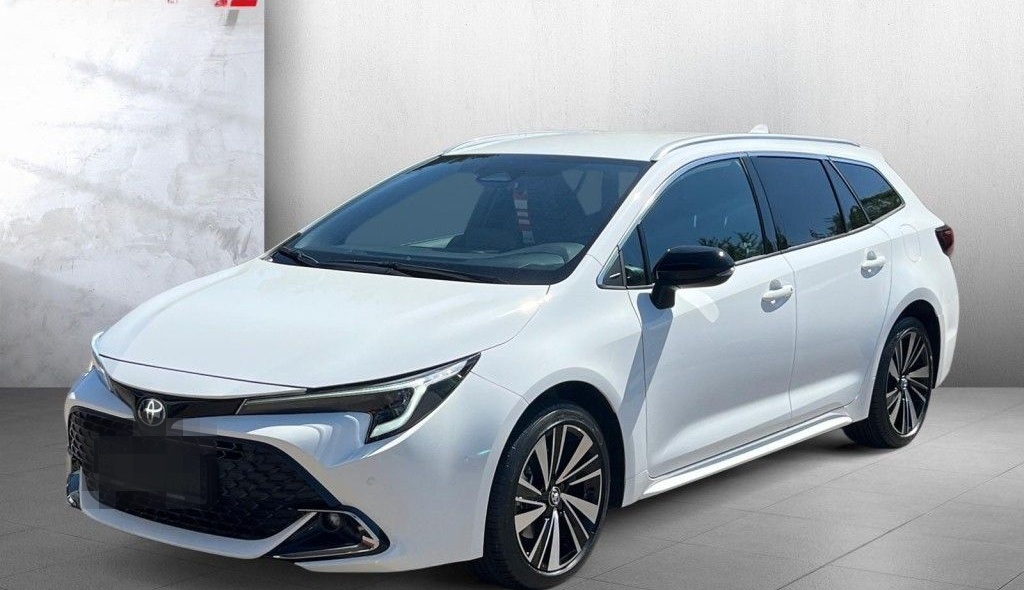 Toyota Corolla 1.8 Hybrid Touring Sports Teamplayer (ZE foto 1