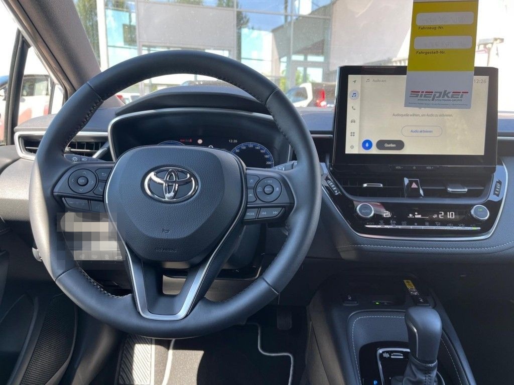 Toyota Corolla 1.8 Hybrid Touring Sports Teamplayer (ZE foto 11