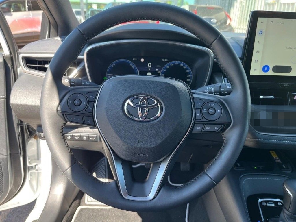 Toyota Corolla 1.8 Hybrid Touring Sports Teamplayer (ZE foto 12