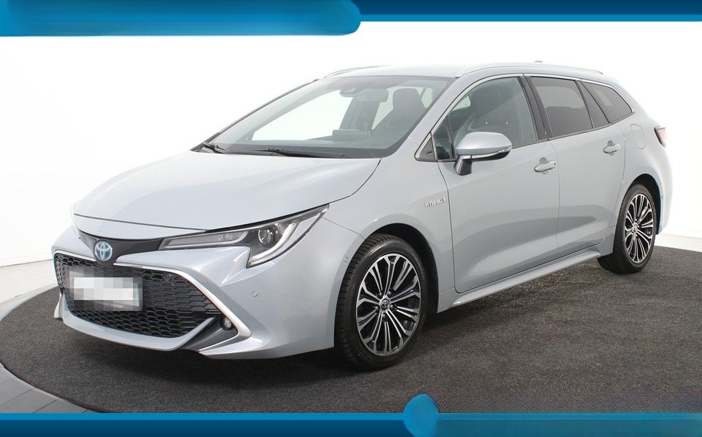 Toyota Corolla 1,8 Hybrid Touring *1.Hand*T-Leder*Navi* foto 1