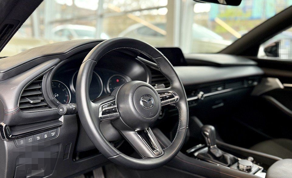 Mazda 3 Homura foto 11