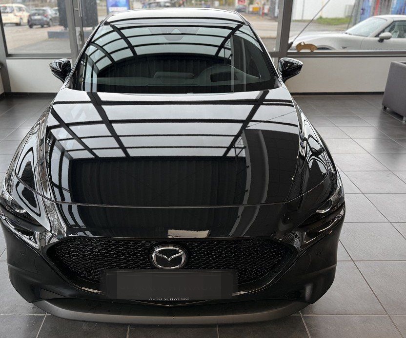 Mazda 3 Homura foto 3
