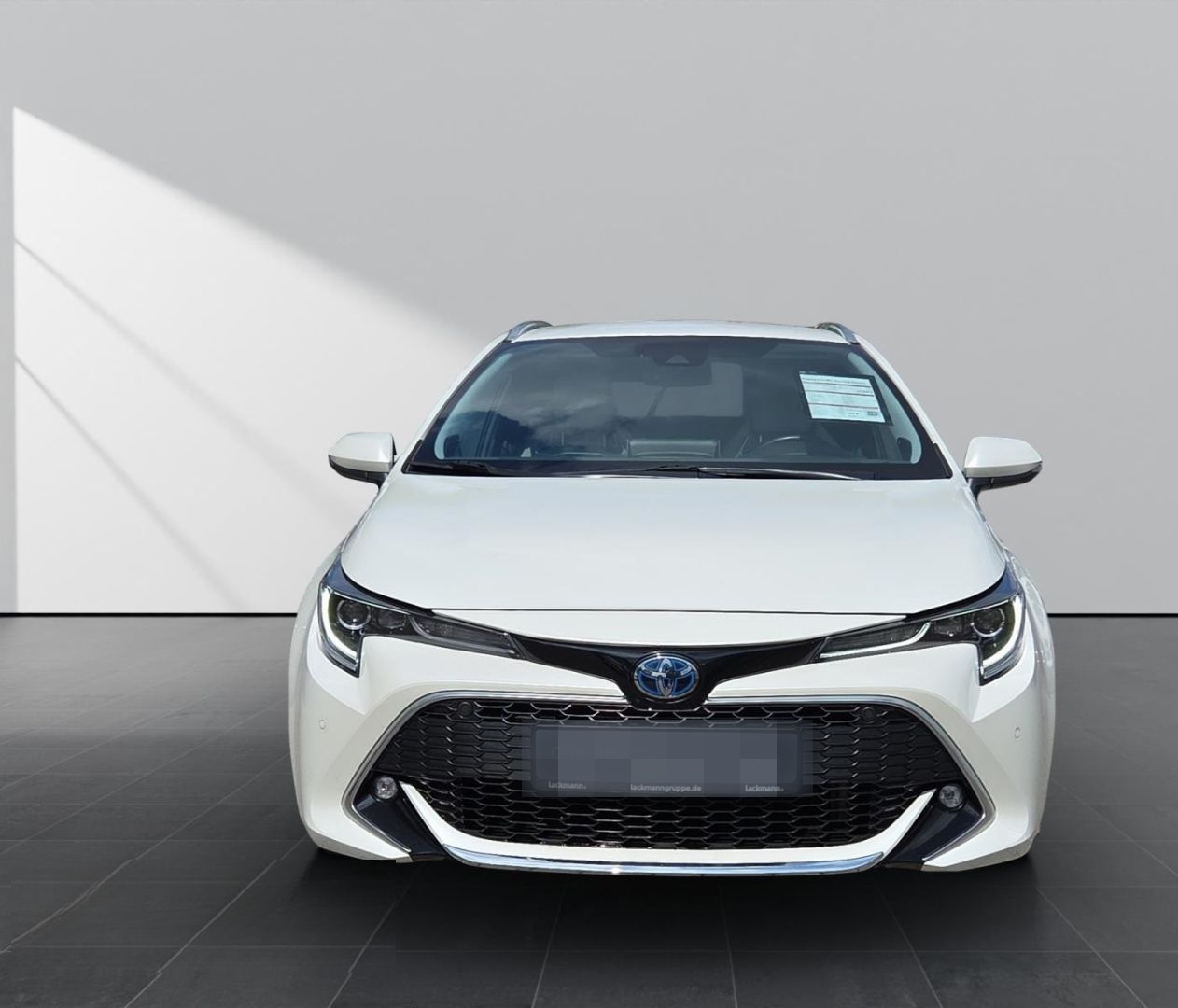 Toyota Corolla TS 2.0 Hybrid Lounge  *Navi*Leder*Techni foto 3