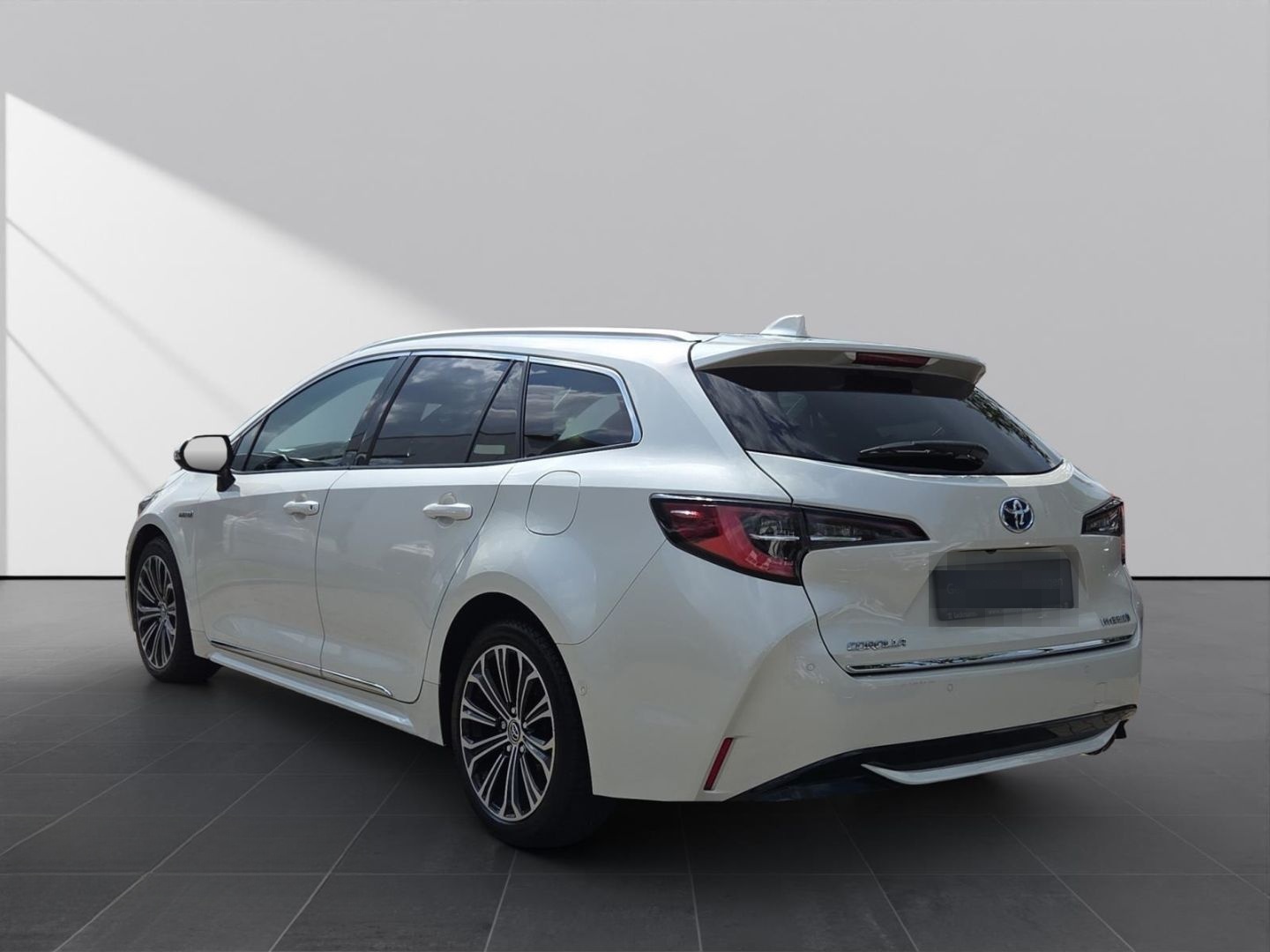 Toyota Corolla TS 2.0 Hybrid Lounge  *Navi*Leder*Techni foto 7
