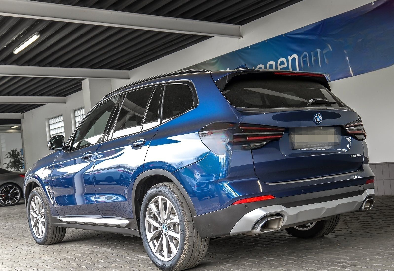 BMW X3 xDrive30e HuD HiFi DA PA+ Amb. Licht foto 7