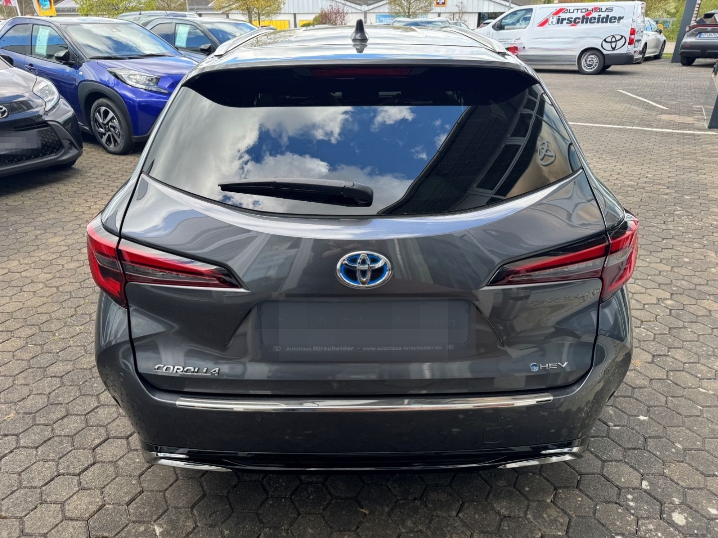 Toyota Corolla 1.8 Hybrid Touring Sports Teamplayer*Tec foto 3