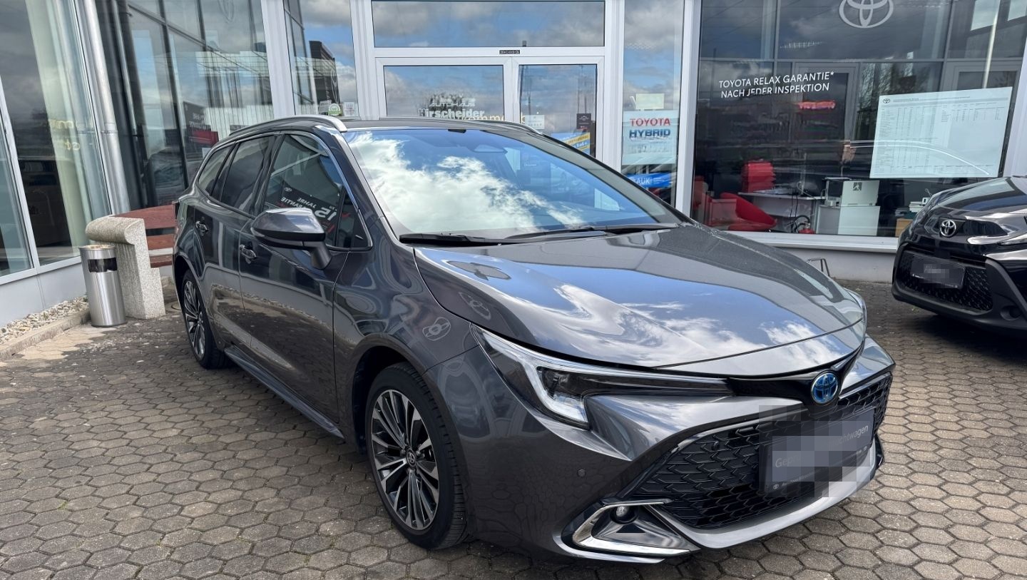 Toyota Corolla 1.8 Hybrid Touring Sports Teamplayer*Tec foto 4