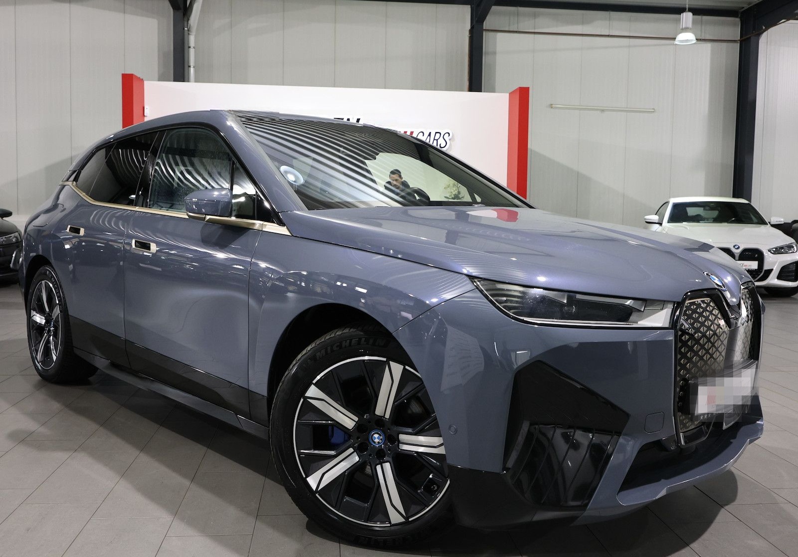 BMW iX 40 xDrive SPORT TITAN GLAS STORM EINZELSTÜCK foto 2