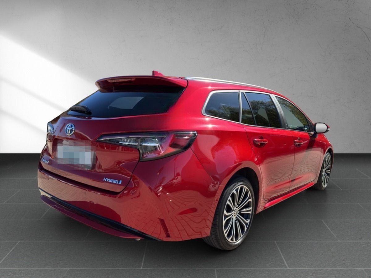 Toyota Corolla TS 1.8 Hybrid Team D *2XPDC*BI-LED*NAV* foto 12