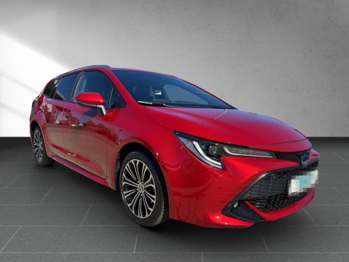 Toyota Corolla TS 1.8 Hybrid Team D *2XPDC*BI-LED*NAV* foto 9