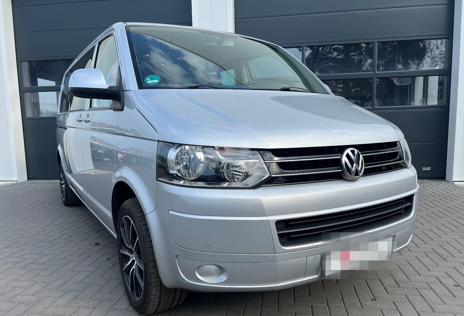Volkswagen T5 Caravelle Comf. lang DSG 9 Sitzer AHK PDC Nav foto 4