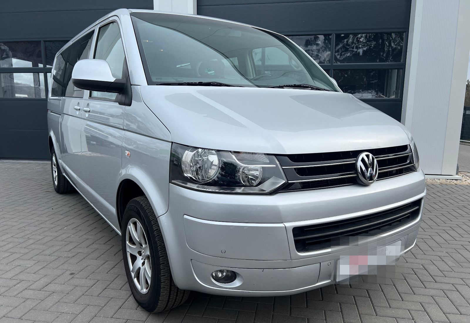 Volkswagen T5 Caravelle lang Comf. Klima PDC AHK 9 Sitzer foto 4