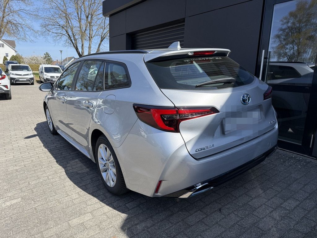 Toyota Corolla Touring Sports 1.8 Hybrid Business Editi foto 4