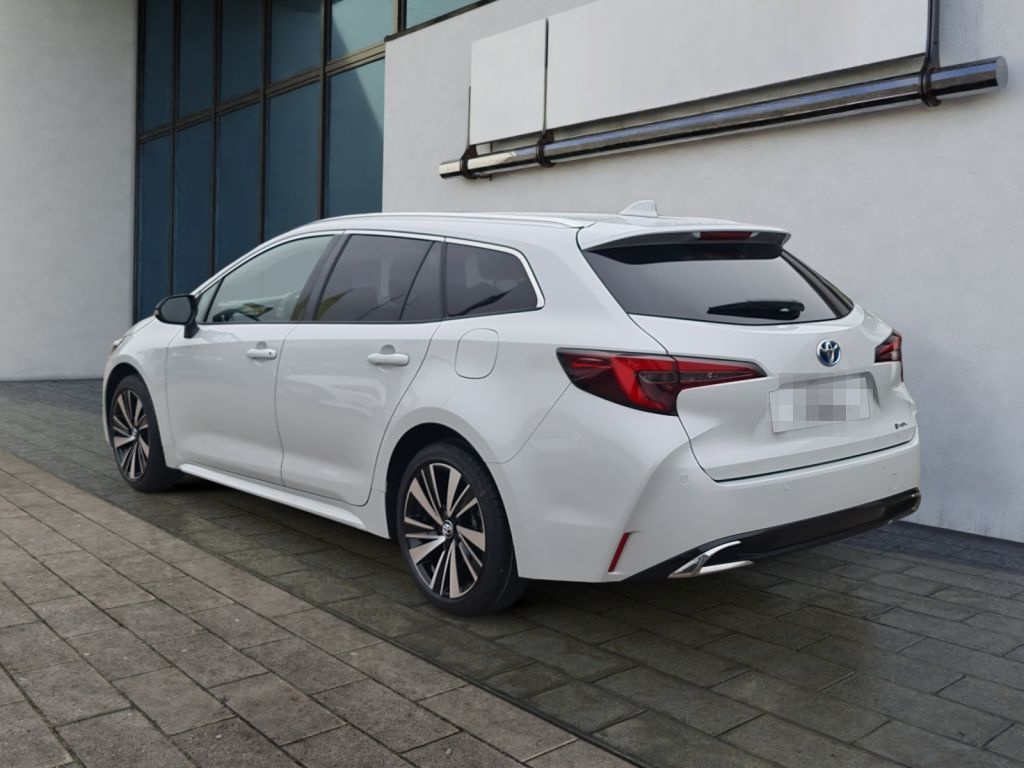 Toyota Corolla 1.8 Hybrid Touring Sports Teamplayer (ZE foto 3