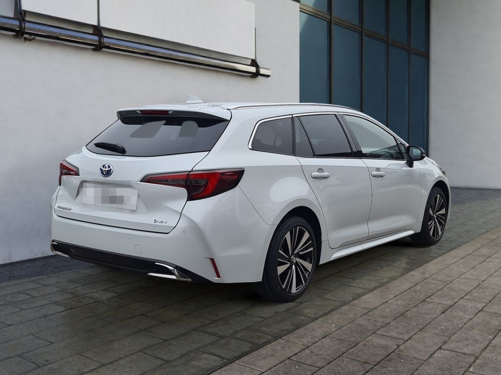 Toyota Corolla 1.8 Hybrid Touring Sports Teamplayer (ZE foto 6
