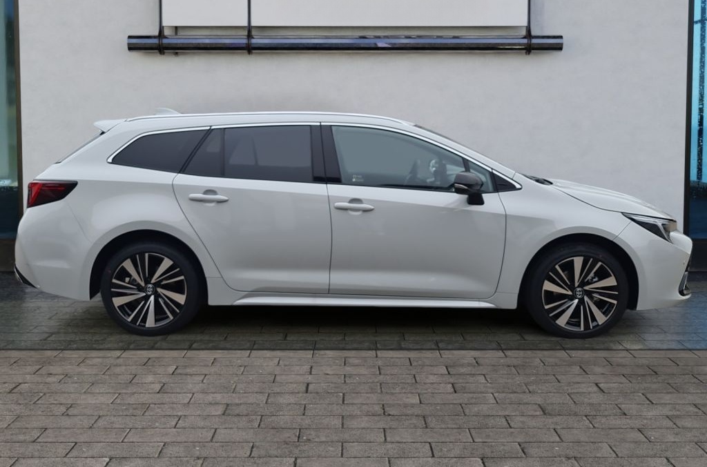 Toyota Corolla 1.8 Hybrid Touring Sports Teamplayer (ZE foto 7