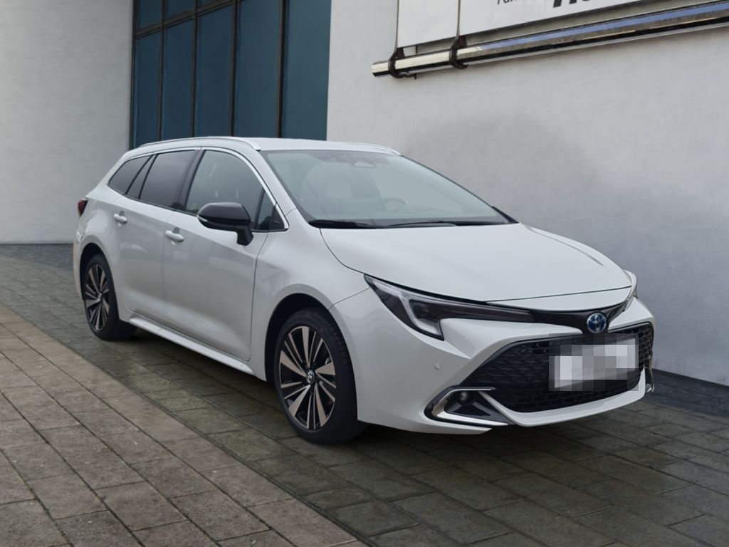 Toyota Corolla 1.8 Hybrid Touring Sports Teamplayer (ZE foto 8