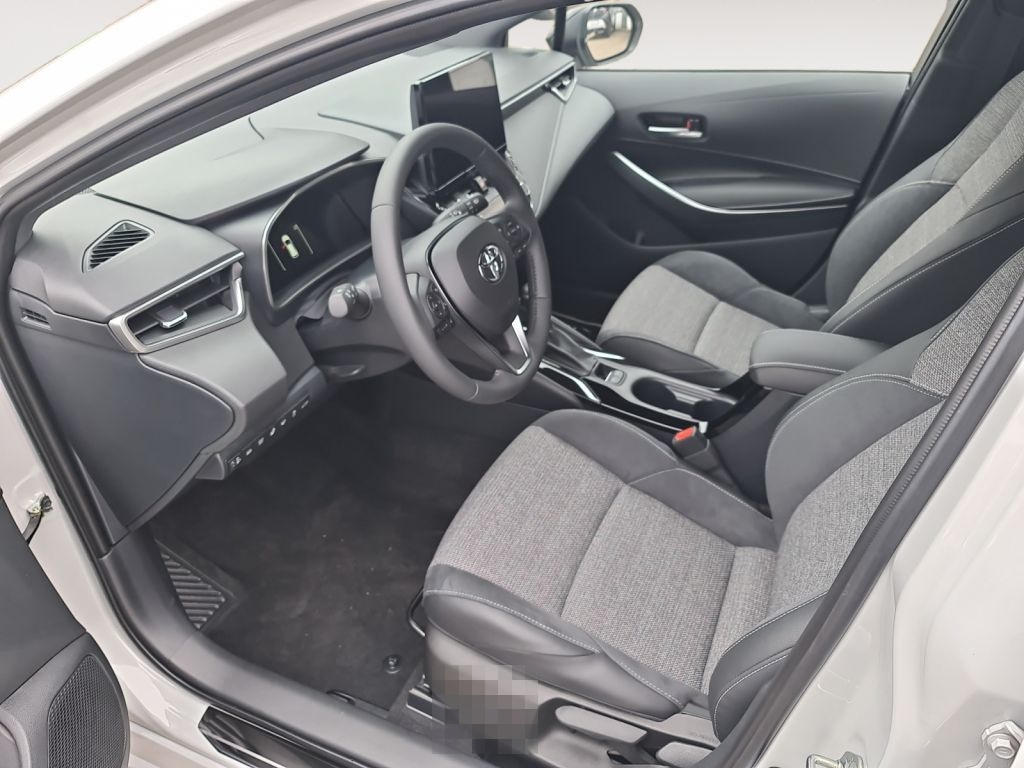 Toyota Corolla 1.8 Hybrid Touring Sports Teamplayer (ZE foto 10