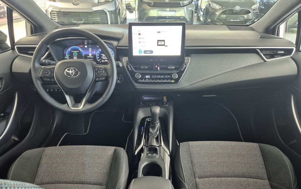Toyota Corolla 1.8 Hybrid Touring Sports Teamplayer + T foto 3