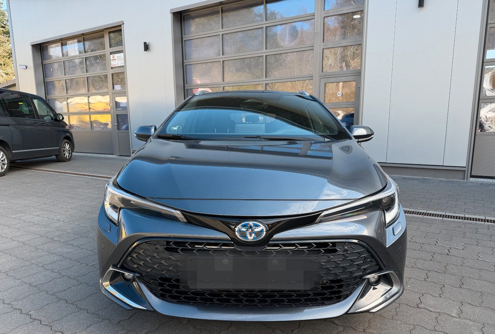 Toyota Corolla 1.8 Hybrid Touring Sports Style AHK*TOP* foto 2