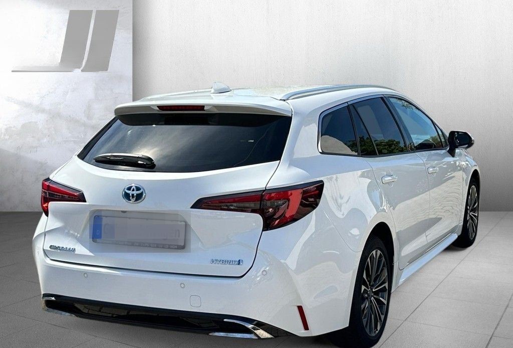 Toyota Corolla 1.8 Hybrid Touring Sports Team D foto 3