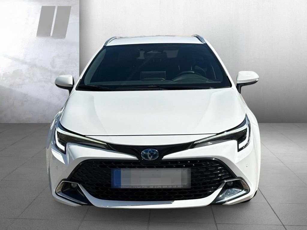 Toyota Corolla 1.8 Hybrid Touring Sports Team D foto 4