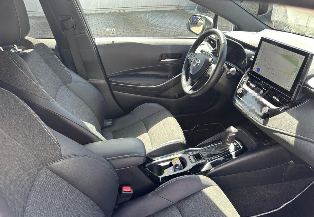 Toyota Corolla 1.8 Hybrid Touring Sports Team D foto 8