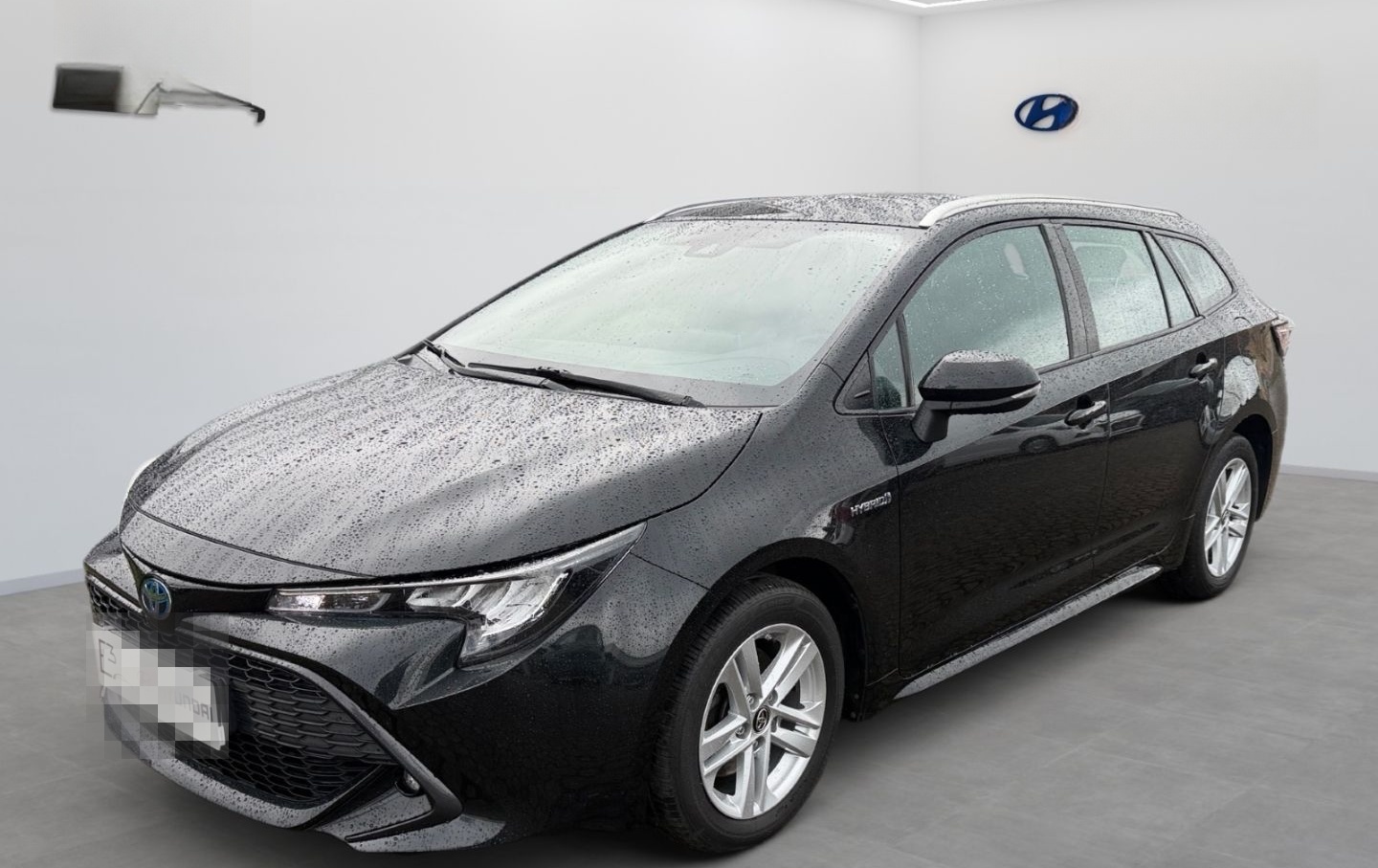Toyota Corolla Touring Sports Hybrid Business Edition foto 1