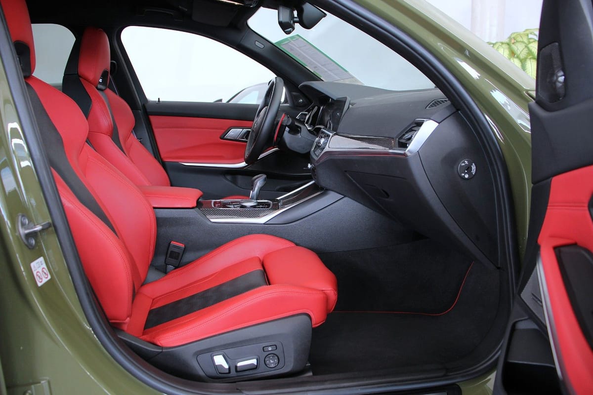 BMW M3 xDrive Competition (G80) Laser Carbon H&K HUD foto 14